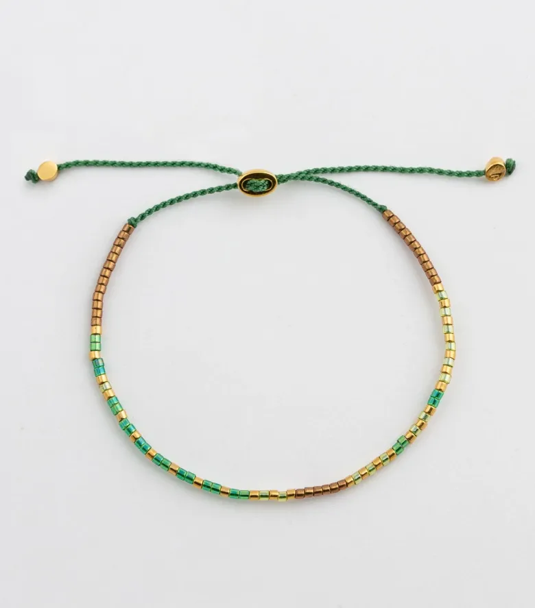 Syster P Code Armband Guld GOOD VIBES