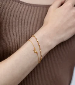 Syster P Herringbone Twisted Armband Guld